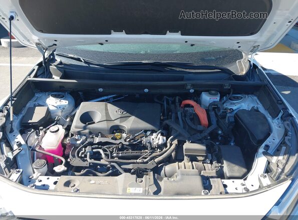 4T3MWRFV9RU152326 2024 TOYOTA RAV4 HYBRID White Rear view