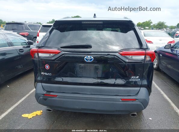 4T3R6RFV0MU019128 2021 TOYOTA RAV4 HYBRID Black 