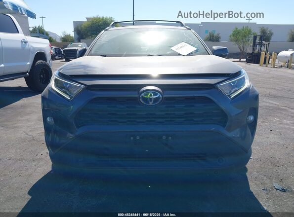 4T3RWRFV0MU040481 2021 TOYOTA RAV4 HYBRID Gray Rear interior view