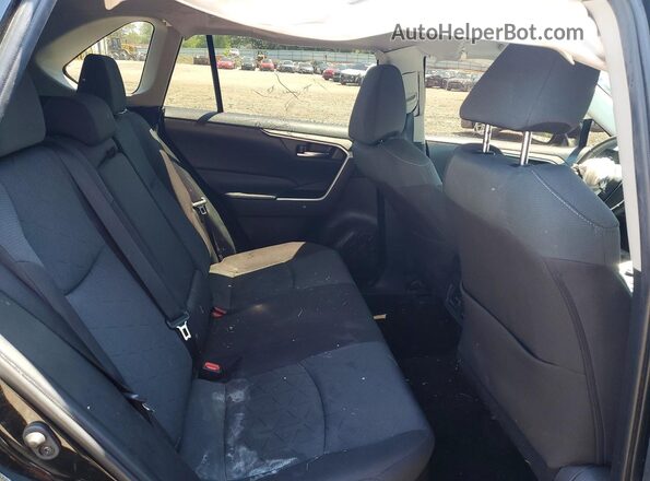4T3RWRFV0RU147232 2024 TOYOTA RAV4 Black Vista de los asientos traseros