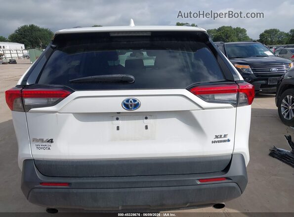 4T3RWRFV1MU047309 2021 TOYOTA RAV4 HYBRID White 