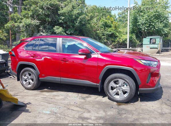 4T3RWRFV2RU142551 2024 TOYOTA RAV4 HYBRID Red Widok wnętrza z tyłu