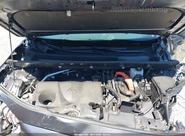 4T3RWRFV3RU135396 2024 TOYOTA RAV4 HYBRID Gray Rear view