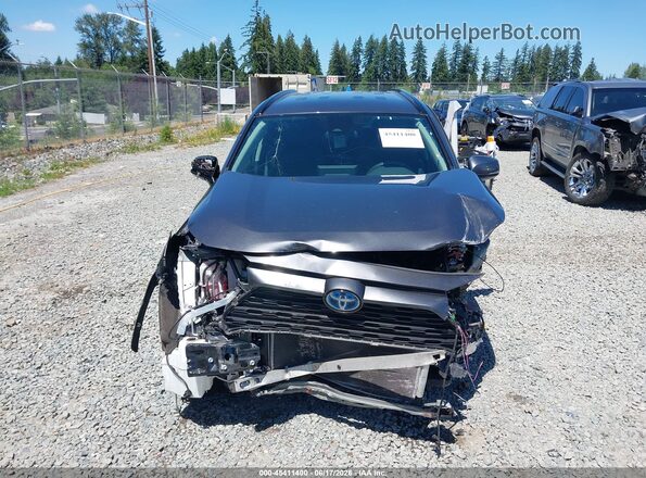 4T3RWRFV3RU135396 2024 TOYOTA RAV4 HYBRID Gray Rear interior view