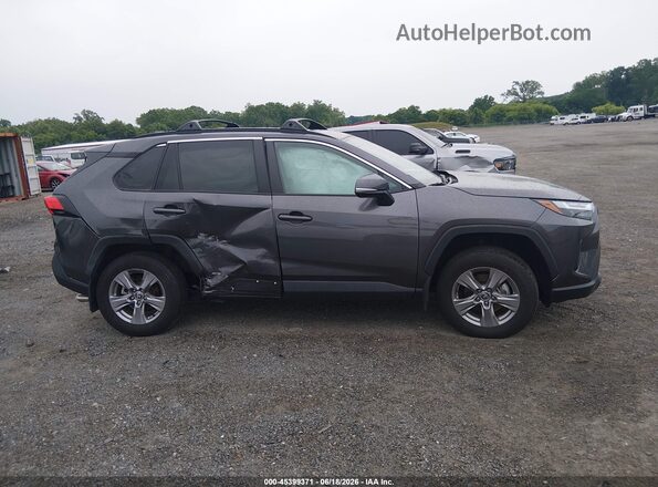 4T3RWRFV5RU110323 2024 TOYOTA RAV4 HYBRID Gray Rear interior view