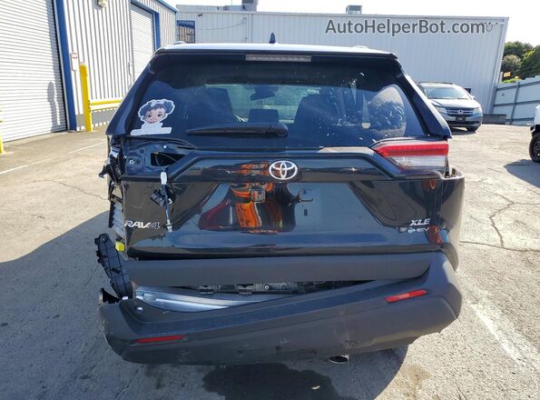 4T3RWRFV6SU206709 2025 TOYOTA RAV4 Black Rear view
