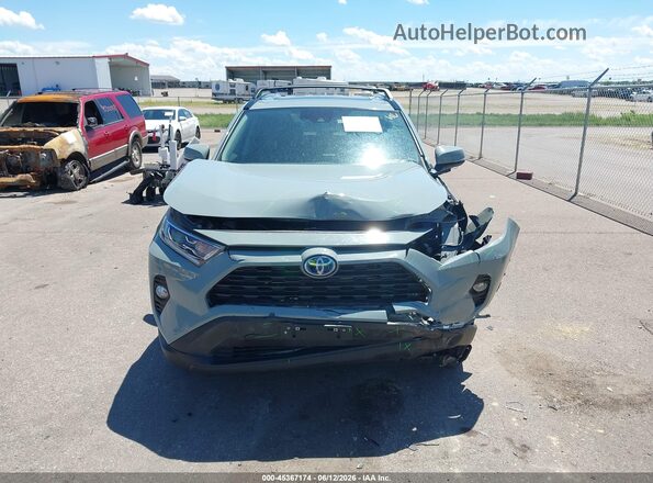 4T3RWRFV7MU014878 2021 TOYOTA RAV4 HYBRID Gray Rear interior view