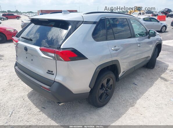 4T3RWRFV7PU093599 2023 TOYOTA RAV4 HYBRID Silver Задня права чверть