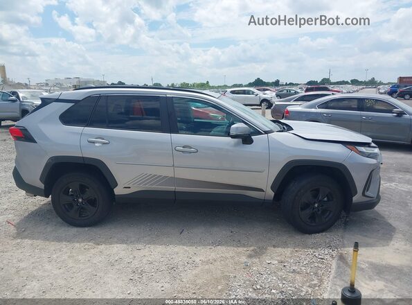 4T3RWRFV7PU093599 2023 TOYOTA RAV4 HYBRID Silver Вид задньої частини салону