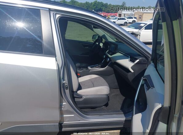 4T3RWRFV8MU033438 2021 TOYOTA RAV4 HYBRID Silver Vista interior delantera