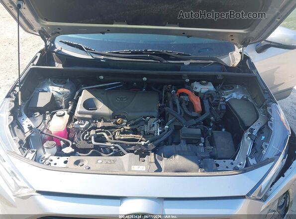 4T3RWRFV8MU033438 2021 TOYOTA RAV4 HYBRID Silver Vista trasera