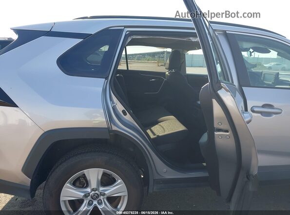4T3RWRFV9MU038454 2021 TOYOTA RAV4 HYBRID Silver VIN sticker view