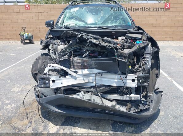 4T3RWRFV9RU114231 2024 TOYOTA RAV4 HYBRID Black Սալոնի հետևի տեսք