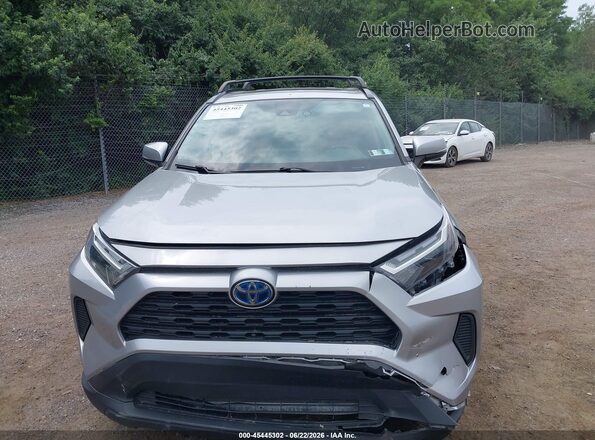 4T3RWRFVXNU052624 2022 TOYOTA RAV4 HYBRID Silver Rear interior view