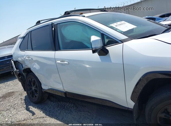 4T3T6RFV1RU145897 2024 TOYOTA RAV4 HYBRID White Vista interior trasera