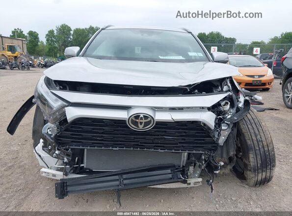 4T3T6RFV5SU190296 2025 TOYOTA RAV4 HYBRID Silver Rear interior view