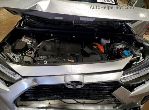 4T3T6RFV8PU121660 2023 TOYOTA RAV4 Silver Vista interior trasera