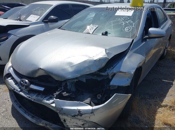 4T4BF1FK0GR529880 2016 TOYOTA CAMRY Silver Rear interior view