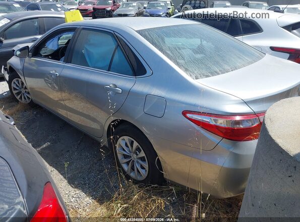 4T4BF1FK0GR529880 2016 TOYOTA CAMRY Silver Rear left