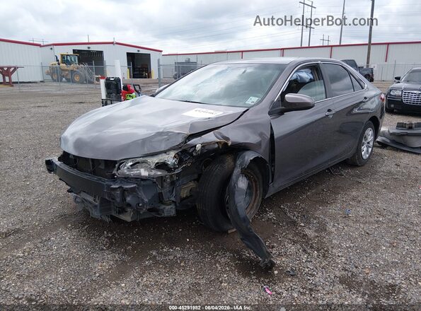 4T4BF1FK1GR577582 2016 TOYOTA CAMRY Gray Vista tres cuartos delantera izquierda
