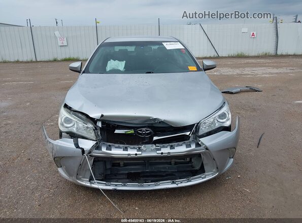 4T4BF1FK5GR559537 2016 TOYOTA CAMRY Silver Սալոնի հետևի տեսք