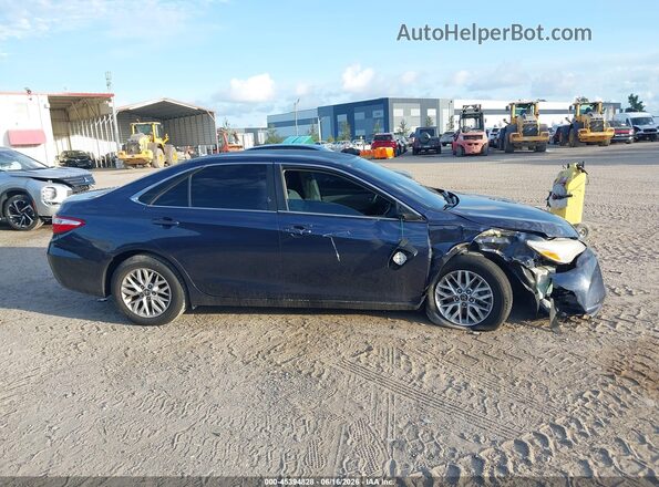 4T4BF1FK5GR571235 2016 TOYOTA CAMRY Navy Vista interior trasera