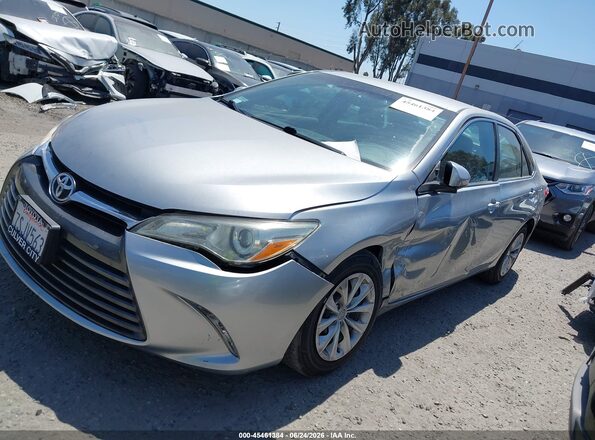 4T4BF1FK7GR570118 2016 TOYOTA CAMRY Silver Առջևի ձախ երեք քառորդ տեսարան