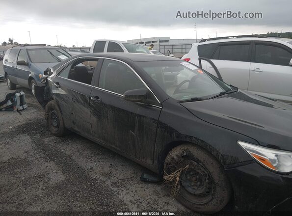 4T4BF1FK8GR526371 2016 TOYOTA CAMRY Black Widok wnętrza z tyłu