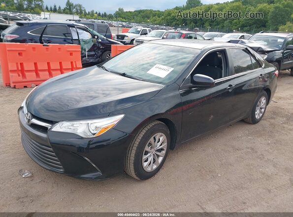 4T4BF1FK8GR526578 2016 TOYOTA CAMRY Black Vista tres cuartos delantera izquierda