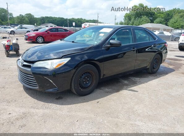 4T4BF1FKXGR522595 2016 TOYOTA CAMRY Black Vista tres cuartos delantera izquierda