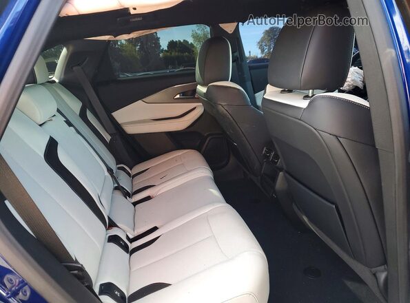 4W5KHMRK2RZ505692 2024 ACURA ZDX Blue Rear interior view
