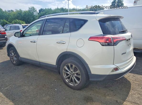 JTMDFREVXGJ054886 2016 TOYOTA RAV4 White 