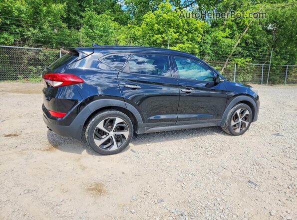 KM8J3CA26GU057802 2016 HYUNDAI TUCSON Gray 
