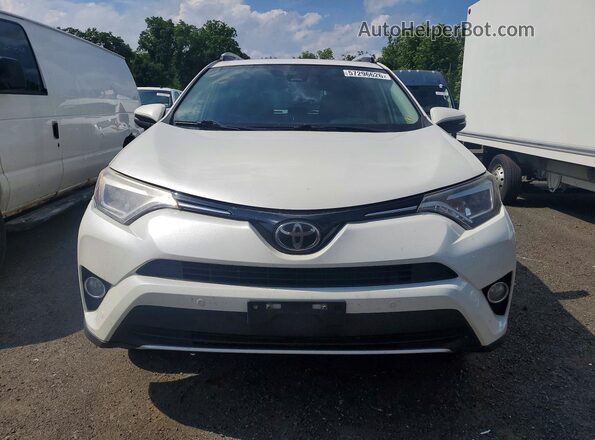 JTMDFREVXGJ054886 2016 TOYOTA RAV4 White 