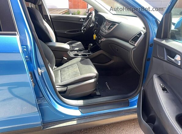 KM8J3CA42GU083136 2016 HYUNDAI TUCSON Blue Vista trasera