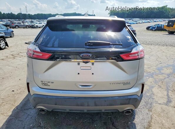 2FMPK3K92KBB42465 2019 FORD EDGE Серебряный Вид салона спереди