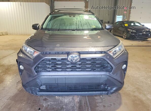 2T3P1RFV7KW082195 2019 TOYOTA RAV4 Gray Vista trasera