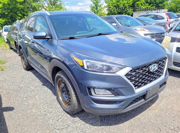 KM8J3CA42LU239606 2020 HYUNDAI TUCSON Charcoal Trasero izquierdo