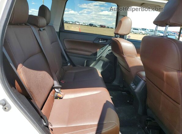 JF2SJEWC4JH437668 2018 SUBARU FORESTER White Rear interior view