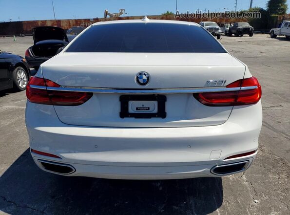 WBA7E2C55KB217759 2019 BMW OTHER White წინა სალონის ხედი