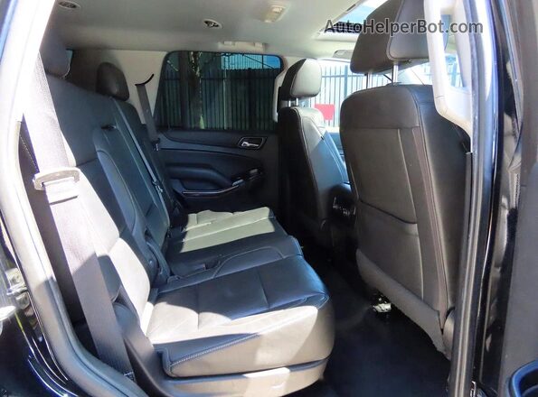 1GNSKBKC8LR154999 2020 CHEVROLET TAHOE Черный Вид салона спереди