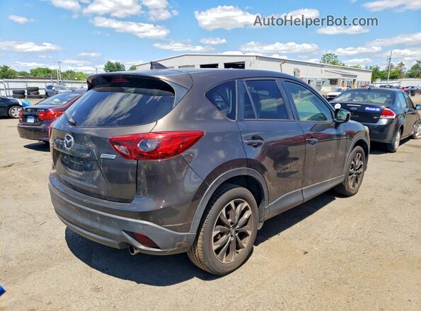 JM3KE4DY9G0773262 2016 MAZDA CX-5 Brown Front right