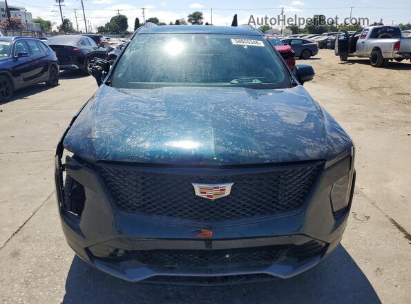 1GYFZER46SF159327 2025 CADILLAC XT4 Green Rear view