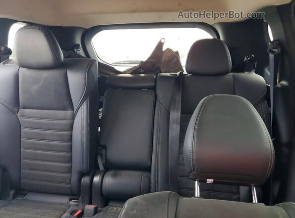 JA4J3VA8XSZ033223 2025 MITSUBISHI OUTLANDER Red Rear interior view