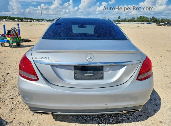 55SWF4JB3GU176308 2016 MERCEDES-BENZ C Серебряный Вид сзади