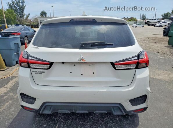 JA4APUAUXMU028325 2021 MITSUBISHI OUTLANDER White Widok wnętrza z przodu