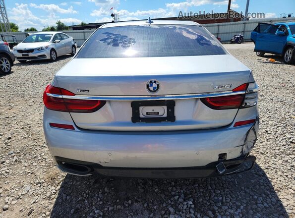 WBA7F2C55GG419198 2016 BMW 7 SERIES Silver Вид салону спереду