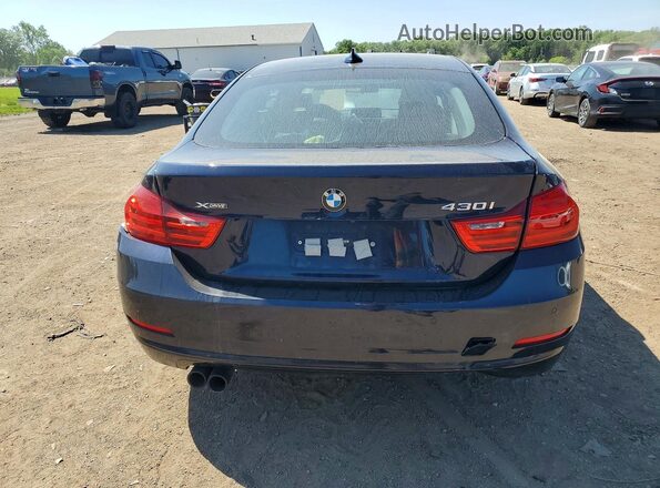 WBA4F9C57HG792076 2017 BMW 4 SERIES Blue Вид салону спереду