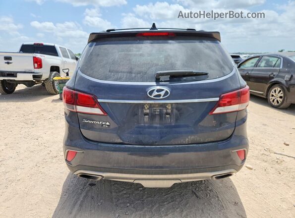 KM8SM4HF2KU305259 2019 HYUNDAI SANTA FE Синий Вид салона спереди