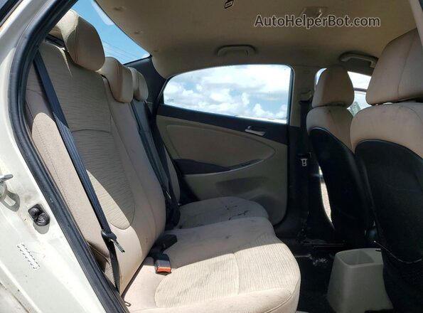 KMHCT4AE4HU220022 2017 HYUNDAI ACCENT Beige Rear interior view